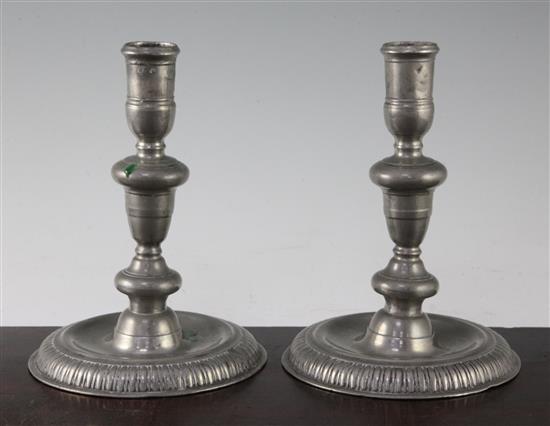 A pair of 18th century pewter candlesticks, 7.25in.